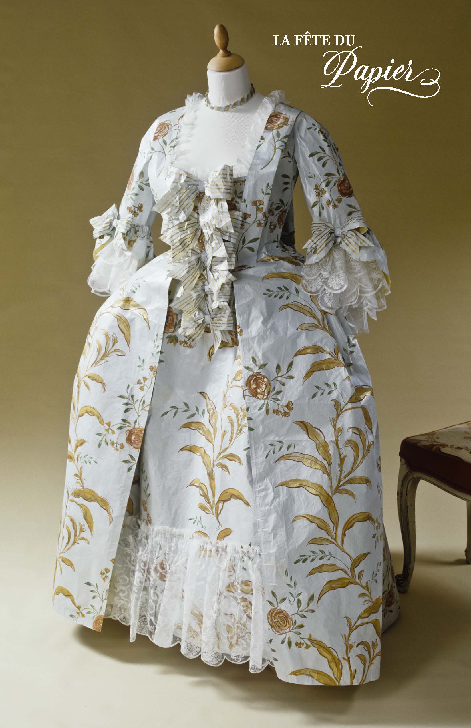 Life-size Madame de Pompadour Court Dress in white with gold fern patterns.